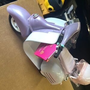 Purple and White Toy Scooter